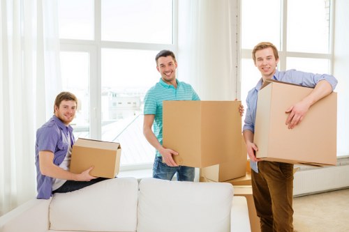 Packed boxes and workstations prepared for office removals