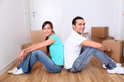 Packed moving boxes and furniture for a house removal