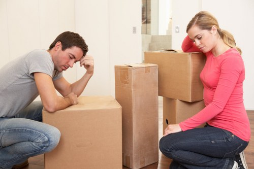 Moving crew transporting furniture during a home move in Dartford